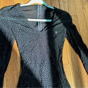 Diamond Mesh Jumpsuit from Fashion Nova’s luxury line